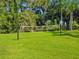 Outdoor fun awaits with a grass volleyball court surrounded by lush greenery at 812 Seneca Meadows Rd, Winter Springs, FL 32708