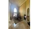 Elegant dining room with high ceilings, large windows, and a chandelier at 8250 Cherry Lake Rd, Groveland, FL 34736