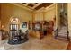 Open kitchen and dining area with marble flooring and large windows for lots of natural light at 8250 Cherry Lake Rd, Groveland, FL 34736