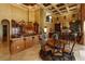 Open floor plan featuring a kitchen with an island, eat-in area, and cathedral ceilings at 8250 Cherry Lake Rd, Groveland, FL 34736