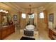 Lavish main bathroom with a soaking tub, chandelier, and dual vanities at 8250 Cherry Lake Rd, Groveland, FL 34736