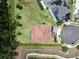Aerial view showing the backyard property lines for this home near a pond at 8478 Elba Isle Ct, Windermere, FL 34786