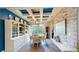 Charming dining room featuring a decorative ceiling, built-in shelves, and ample natural light at 8478 Elba Isle Ct, Windermere, FL 34786