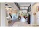 Bright foyer with beautiful hardwood floors, and views to the kitchen, living room, and staircase at 8478 Elba Isle Ct, Windermere, FL 34786