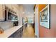 Modern kitchen with stainless steel appliances and stylish blue and white cabinetry at 8478 Elba Isle Ct, Windermere, FL 34786
