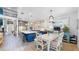 Bright, open kitchen layout with a large island, dining area, and stainless steel appliances for the home chef at 8478 Elba Isle Ct, Windermere, FL 34786