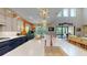Bright kitchen featuring a large island with a sink, pendant lighting, and ample counter space at 8478 Elba Isle Ct, Windermere, FL 34786