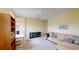 Upstairs living room featuring an adjacent room, couch, and natural light at 8478 Elba Isle Ct, Windermere, FL 34786