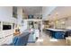 Open concept living space showcasing living room, kitchen with island, and staircase at 8478 Elba Isle Ct, Windermere, FL 34786