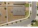 An aerial view showcases the neat landscaping and brown roof of this lovely home in a quiet neighborhood at 849 Avenal Ln, Davenport, FL 33837