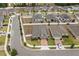Charming single-Gathering homes with brick driveways and well-maintained lawns line this quiet neighborhood street at 849 Avenal Ln, Davenport, FL 33837