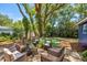 Inviting backyard with outdoor seating, creating a relaxing and private space at 8619 Veridian Dr, Orlando, FL 32810