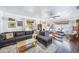 Comfortable living area with a large sofa, accent chairs, and plenty of natural light at 8619 Veridian Dr, Orlando, FL 32810