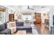 Bright and airy living room with stylish seating and a view into the dining area at 8619 Veridian Dr, Orlando, FL 32810