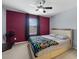 Bedroom with a zebra patterned bed and natural light through window at 9009 Savannah Julip Ln, Orlando, FL 32832