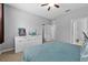 Cozy bedroom featuring ample natural light, neutral walls, and plenty of closet space at 9009 Savannah Julip Ln, Orlando, FL 32832