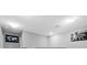 Upstairs hallway leading to bedrooms with modern lighting fixtures at 9009 Savannah Julip Ln, Orlando, FL 32832