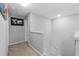 Bright upstairs hallway with 'Choose Adventure' sign above the stairwell at 9009 Savannah Julip Ln, Orlando, FL 32832