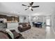 Open-concept living space with kitchen, dining, and living areas at 9009 Savannah Julip Ln, Orlando, FL 32832