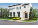 Stunning two-story home featuring elegant architecture, manicured landscaping, and a welcoming entrance at 9730 Lounsberry Cir, Golden Oak, FL 32836