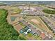 Aerial view of community and nearby baseball and tennis fields at 10139 Austrina Oak Loop, Winter Garden, FL 34787