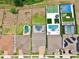 Aerial view of fenced yards with pools, spas, and sports courts at 10139 Austrina Oak Loop, Winter Garden, FL 34787