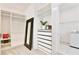 Walk-in closet featuring built-in shelving and ample storage space at 10139 Austrina Oak Loop, Winter Garden, FL 34787