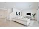 Beautifully decorated living room featuring a white sofa and modern decor at 10139 Austrina Oak Loop, Winter Garden, FL 34787