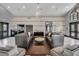 Inviting lounge area with stylish seating, modern decor, and access to common amenities at 10139 Austrina Oak Loop, Winter Garden, FL 34787