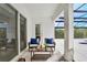 Charming patio with stylish seating, offering a serene spot for relaxation and outdoor enjoyment at 10139 Austrina Oak Loop, Winter Garden, FL 34787