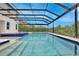 The inviting pool area has a screened-in enclosure, providing both privacy and protection from the elements at 10139 Austrina Oak Loop, Winter Garden, FL 34787