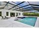 The backyard boasts a beautiful swimming pool and spa enclosed with a screened-in structure at 10139 Austrina Oak Loop, Winter Garden, FL 34787