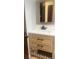 This bathroom boasts a modern vanity, black faucet, updated drawers, and ample storage at 112 Crown Oaks Way # 112, Longwood, FL 32779