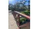 Charming bridge spanning a waterway adds character and enhances the natural beauty of the surrounding landscape at 112 Crown Oaks Way # 112, Longwood, FL 32779