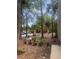 Mature trees surround the exterior, landscape and buildings in this quiet, well-kept community at 112 Crown Oaks Way # 112, Longwood, FL 32779