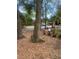 Mature trees surround the exterior, landscape and buildings in this quiet, well-kept community at 112 Crown Oaks Way # 112, Longwood, FL 32779