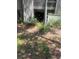 Charming condo exterior with lush landscaping and inviting entrance in a serene setting at 112 Crown Oaks Way # 112, Longwood, FL 32779