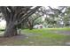 Community playground with green space, creating a fun recreational area for residents at 112 Crown Oaks Way # 112, Longwood, FL 32779
