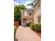 Charming two-story home with neutral exterior, brick walkway, and well-maintained landscaping at 1130 Hardy Ave, Orlando, FL 32803