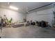 Spacious garage with concrete floor, shelving, storage and a sectional sofa at 1130 Hardy Ave, Orlando, FL 32803