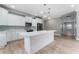 Bright, renovated kitchen with white cabinets, quartz counters, and stainless appliances at 1130 Hardy Ave, Orlando, FL 32803