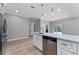 Kitchen island with stainless steel appliances and lots of space to eat and prepare meals at 1130 Hardy Ave, Orlando, FL 32803