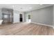 Laundry area and utility closet lead to a backyard paved patio at 1130 Hardy Ave, Orlando, FL 32803