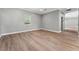 Bright, open living room with hardwood floors and ample natural light at 1130 Hardy Ave, Orlando, FL 32803