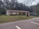 Charming single story home with mature landscaping and neutral paint scheme at 123 N High St, Lake Mary, FL 32746
