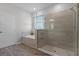 Bathroom with a glass enclosed shower and a tub at 1232 Turnbridge Pl, Oviedo, FL 32765