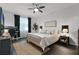 Comfortable bedroom with a ceiling fan, a work station, and neutral colors at 1232 Turnbridge Pl, Oviedo, FL 32765