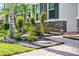 Up close view of the professional landscaping featuring stone and mulch at 1232 Turnbridge Pl, Oviedo, FL 32765