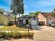 Single-story home featuring a well-kept lawn and attached garage at 1240 Pin Oak Dr, Apopka, FL 32703