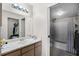 Bathroom with a single sink, neutral tile floor and a shower-tub combo at 13839 Fairway Island Dr # 1116, Orlando, FL 32837